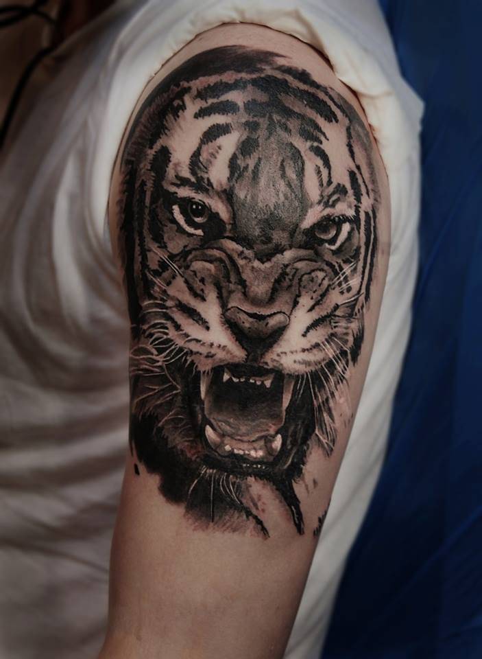 Realistic tiger Arm Tattoo
